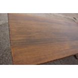 An oak dining table with planked top, on square supports, 84" long x 36" wide x 30" high