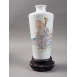 A Chinese porcelain tapered vase, decorated immortal and child carrying a gourd, seal mark to base