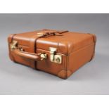 A William Powell tan leather four-division cartridge box, 12 1/4" wide