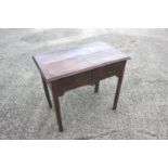 An 18th century walnut side table, fitted two drawers, on chamfered supports, 32" wide x 18 1/2"