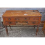 A 19th century mahogany desk, fitted five drawers, on turned supports, 42" wide x 17 1/2" deep x