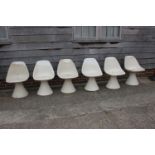 A set of six 1970s fibreglass AeroSarin white tulip chairs (one chair in half, others have damages)