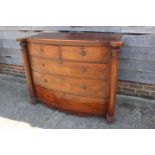 A 19th century mahogany bowfront chest of two short and three long graduated drawers with flanking