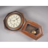 A Seikosha oak cased drop dial wall clock, 30" high