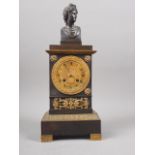An Empire style mantel clock with gilt brass Apollo's head finial, gilt dial by Anglesa Marseille,