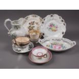 A 19th century relief moulded transfer decorated jug, three cabinet cups and a number of saucers,