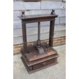 An early 19th century carved oak book press with acanthus scrolls, on stand, 37" wide x 21" deep x