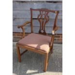 A 19th century mahogany carver dining chair of Chippendale design with pierced splat back and drop-