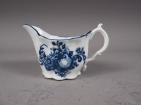 A mid 18th century Worcester "Chelsea ewer cream boat" with blue and white transfer decoration