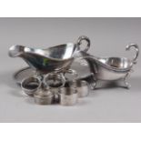 Two silver napkin rings, 0.7oz troy approx, three silver plated napkin rings, two plated sauce boats