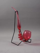 A cranberry glass pipe, 15" high