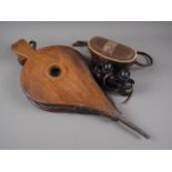 A pair of elm bellows and a pair of 8x30 binoculars, in case