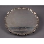 An engraved silver pie-crust edge salver, 28oz troy approx