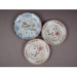A pair of Chinese famille rose and exotic bird decorated plates, 9" dia, and a saucer dish with bird