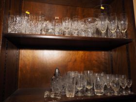 A pair of Waterford wine glasses, a pair of Stuart Crystal whisky tumblers and a quantity of other