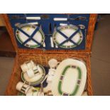 An Optima picnic basket, fitted with cutlery, plates, cups, etc