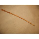A Chinese bamboo walking stick with carved figure and animal decoration, 35 1/2" long
