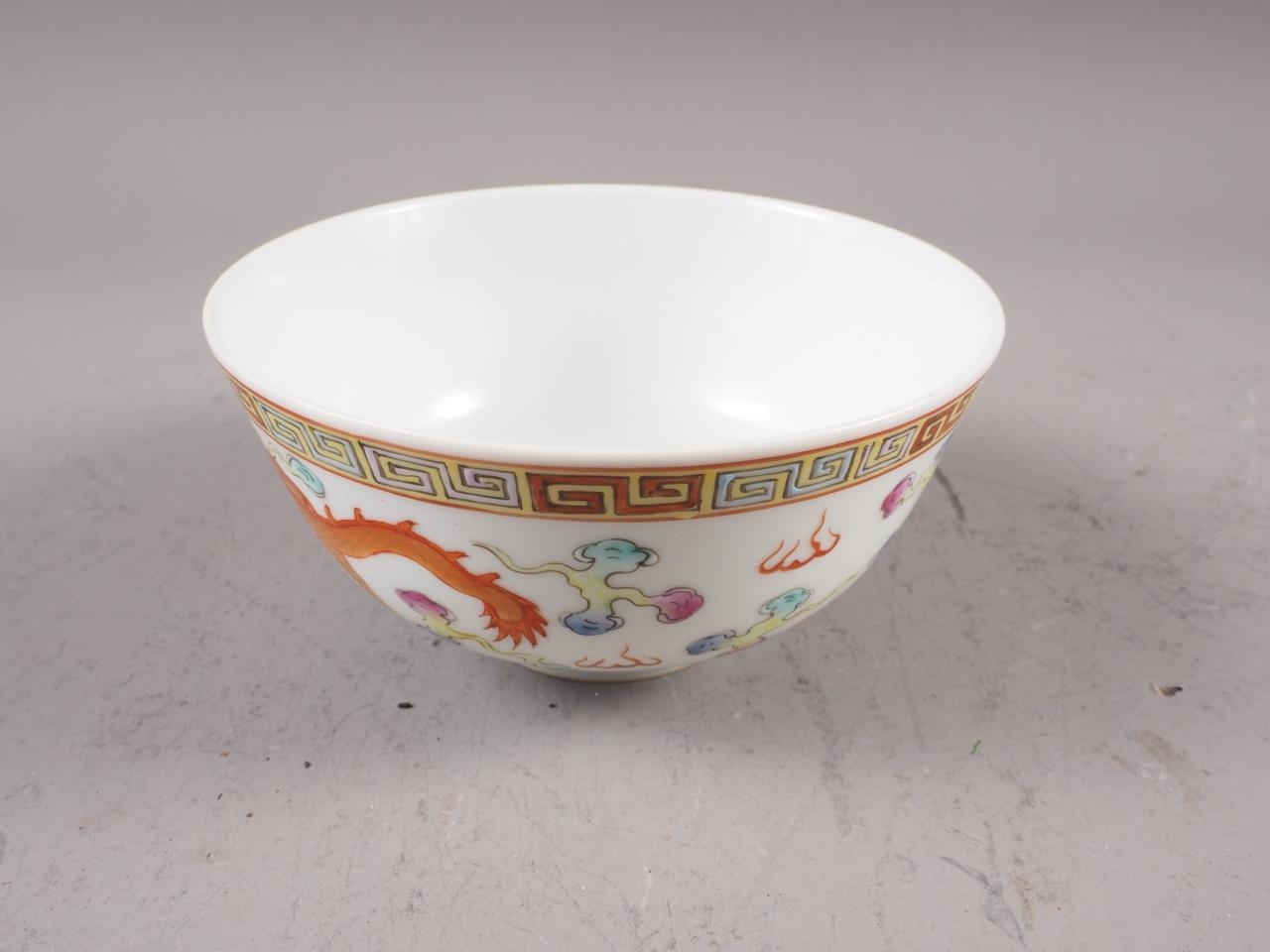 A Chinese porcelain phoenix and dragon decorated bowl with six-character mark, 4 1/2" dia - Image 2 of 11