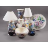 Three Poole pottery table lamps with floral decoration, tallest 7" high, three similar vases, a