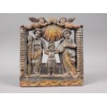 An 18th century South American carved and painted hardwood Christ child with saints, 7" high x 7"