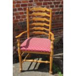 An early 19th century mahogany and inlaid bar back dining chair, on sabre leg supports, a shield