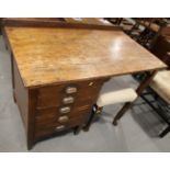 An oak Civil Service pedestal desk with ledge back and five drawers, 42" wide x 24" deep x 28 3/4"