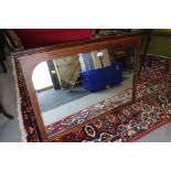An Edwardian walnut and inlaid framed beaded edge wall mirror, arch top plate 34 1/2" wide x 22 1/2"