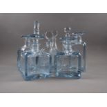 Eight Strombergshyttan clear glass decanters, various sizes and shapes