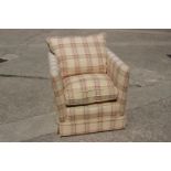 A deep seat square armchair, upholstered in a green check fabric