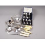 Five silver teaspoons, in case, and a silver napkin ring, 2.1oz troy approx, together with a
