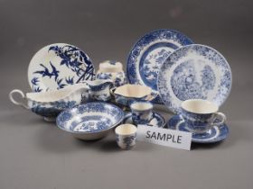 A quantity of blue and white china, including a "Willow" pattern part combination service