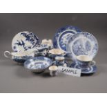 A quantity of blue and white china, including a "Willow" pattern part combination service