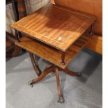 A mahogany two-tier "book table", on tripod splay support, and a pair of two-tier lamp tables,