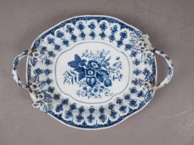 A mid 18th century blue and white Worcester relief decorated two-handled dish, 11" wide (handles