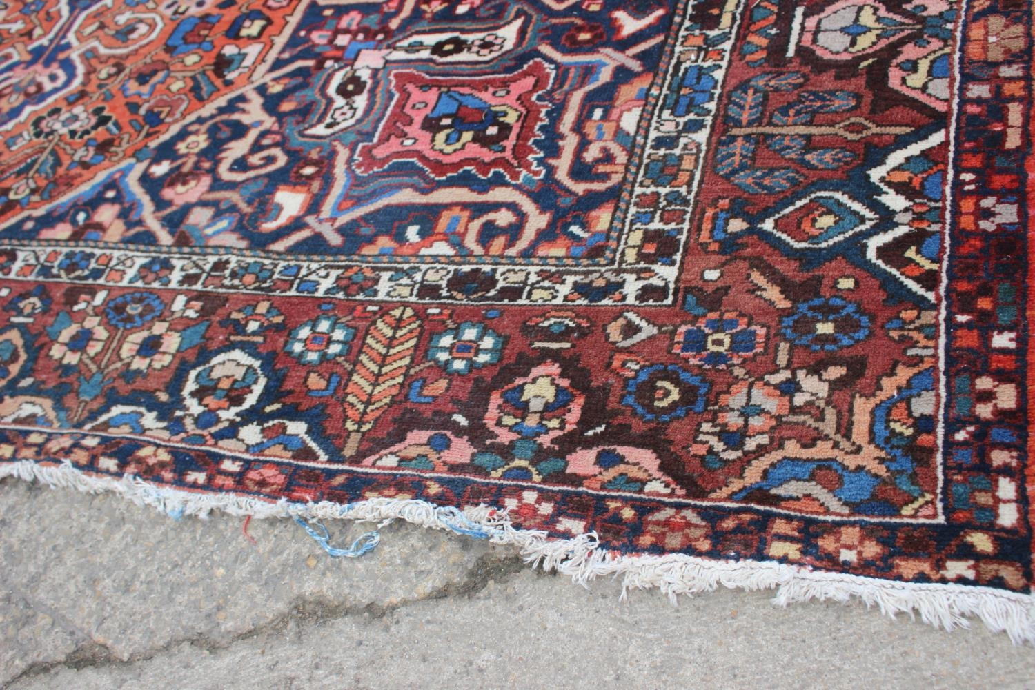 A Hamadan carpet with central star design, on a salmon ground, in shades of blue, brown, pink, - Image 10 of 14