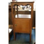 A walnut tray top bedside cupboard, on square supports, 14 1/2" wide x 13" deep x 30" high, and a