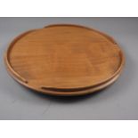 An Ercol elm lazy Susan, 21" dia