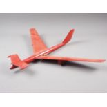 An aeronautical research wind tunnel model of a swept wing plane, 20" long