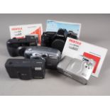 A Canon EOS 650 camera, a Pentax Espio 928 camera, and three others