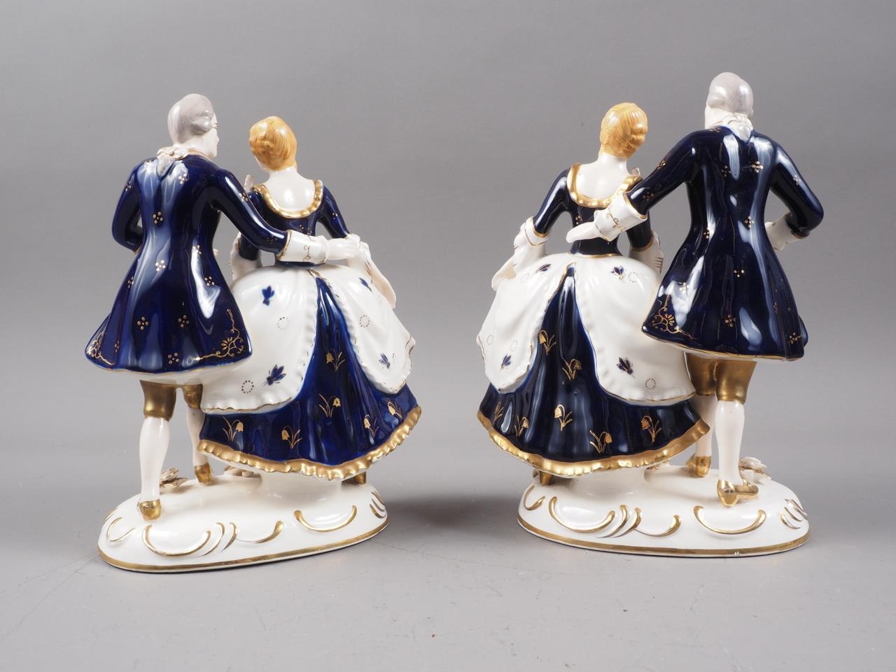 A pair of Japanese porcelain groups, figures in period costume with gilt decoration, 8" high - Image 3 of 4