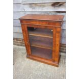 A late 19th century walnut and inlaid display cabinet enclosed glazed door, on block base, 30"