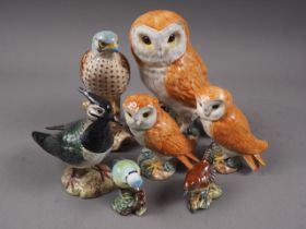 Three Beswick owls, in sizes, two Aynsley ceramic owls, a number of Goebel's ceramic owls and