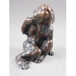 A Japanese patinated model of a monkey, 5 1/2" high (hole to base)