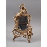 An Art Nouveau gilt brass easel mirror with scroll frame, 13 3/4" high
