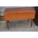 A 19th century mahogany Pembroke table, fitted one drawer, on turned supports, 22" wide x 41" deep x