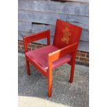 Two 1969 Prince of Wales investiture red lacquered chairs with later upholstery (arms worn)