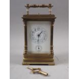A late 19th century brass cased carriage clock with hour repeat and alarm movement, 6 1/2" high