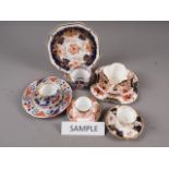 A quantity of Imari pattern tea and coffee wares, including Royal Crown Derby, Coalport, etc