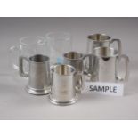 A quantity of pewter tankards, twenty-one approx, and three similar glass tankards