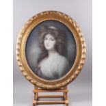 A 19th century oval pastel portrait of a young female, 21" x 18", in gilt frame